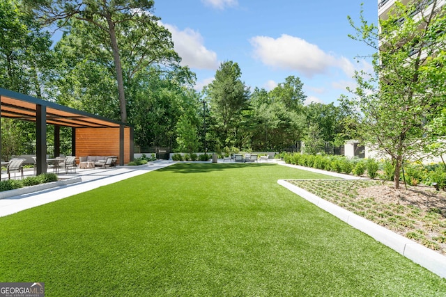 2660 Peachtree Rd Unit 6A, Atlanta, GA 30305 - view of grassy yard with outdoor lounge area and a patio