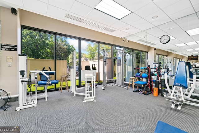 2660 Peachtree Rd Unit 6A, Atlanta, GA 30305 - exercise room featuring healthy amount of natural light and a paneled ceiling