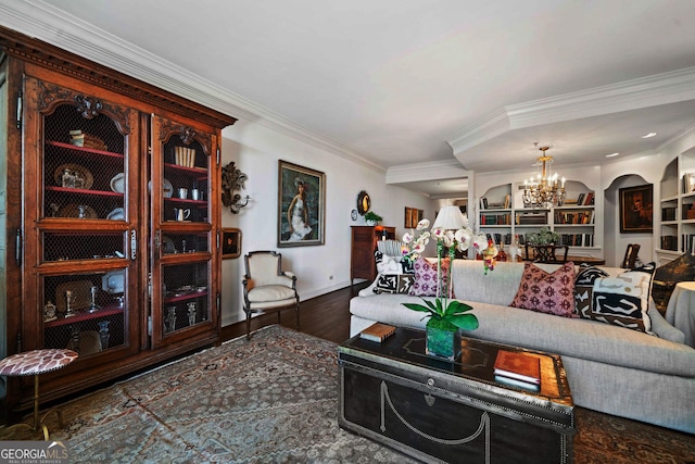 2660 Peachtree Rd Unit 6A, Atlanta, GA 30305 - living area featuring crown molding, a chandelier, wood finished floors, and built in shelves