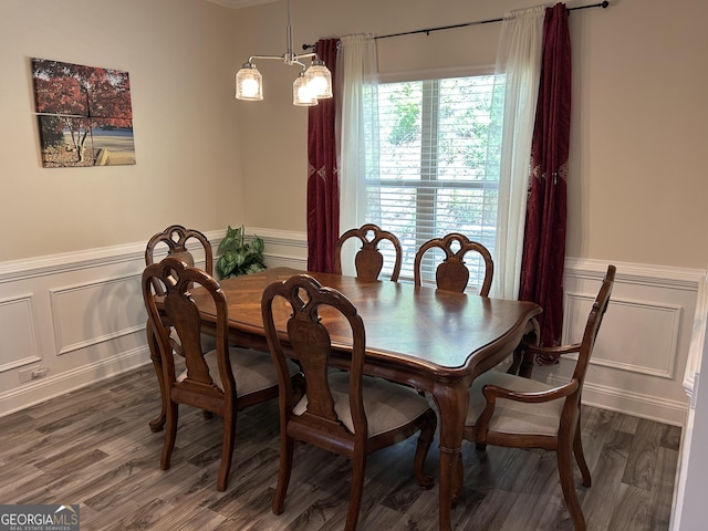 2289 Remington Dr, Commerce, GA 30529 - dining space with a decorative wall, a wainscoted wall, and wood finished floors