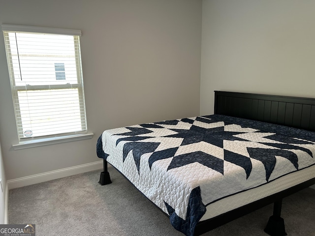 2289 Remington Dr, Commerce, GA 30529 - carpeted bedroom with baseboards