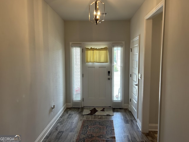 2289 Remington Dr, Commerce, GA 30529 - foyer featuring wood finished floors, a chandelier, and baseboards