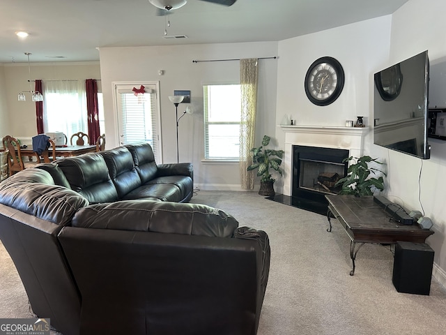 2289 Remington Dr, Commerce, GA 30529 - carpeted living area with ceiling fan, baseboards, and a fireplace