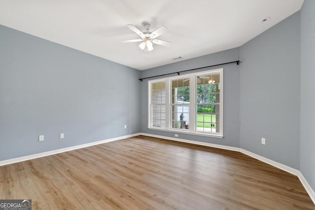 1370 Summer Hollow Rd, Greensboro, GA 30642 - unfurnished room featuring a ceiling fan, baseboards, and wood finished floors