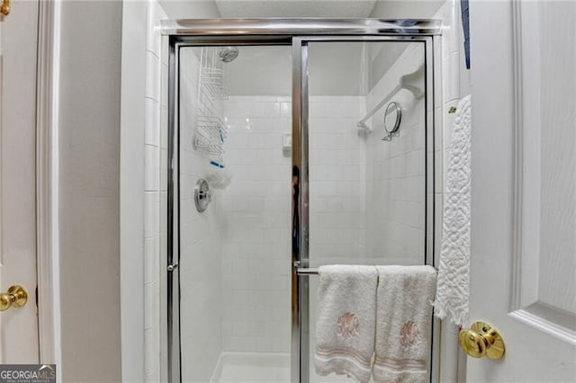 10000 Barston Ct, Johns Creek, GA 30022 - bathroom featuring a shower stall