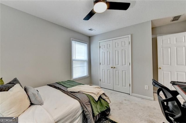 10000 Barston Ct, Johns Creek, GA 30022 - bedroom featuring a closet, light colored carpet, and ceiling fan