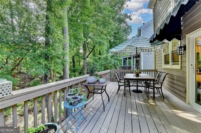 10000 Barston Ct, Johns Creek, GA 30022 - wooden terrace featuring outdoor dining area