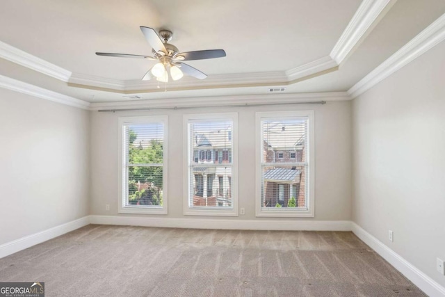 345 Alderwood Ln, Sandy Springs, GA 30328 - spare room featuring a tray ceiling, ornamental molding, carpet flooring, and ceiling fan
