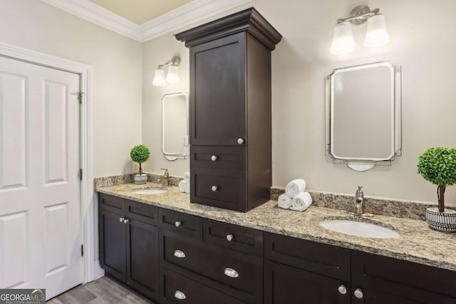 345 Alderwood Ln, Sandy Springs, GA 30328 - full bathroom featuring double vanity, ornamental molding, and wood finished floors