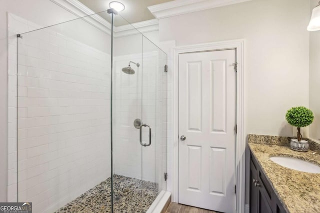 345 Alderwood Ln, Sandy Springs, GA 30328 - bathroom featuring crown molding, a stall shower, and vanity