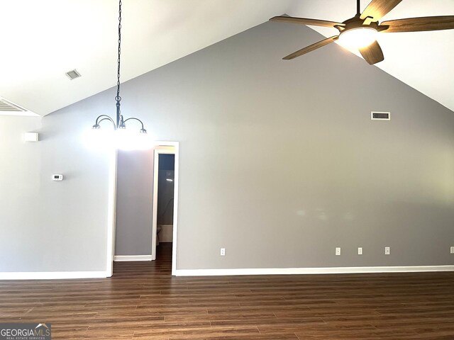 1905 Ridgefield Way, Dalton, GA 30720 - empty room featuring lofted ceiling, wood finished floors, ceiling fan, baseboards, and a chandelier