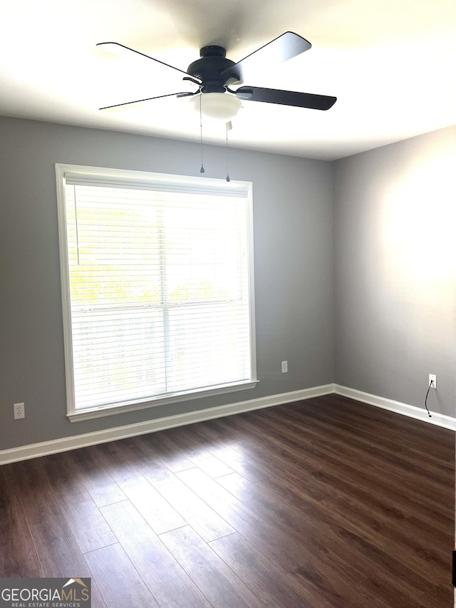 1905 Ridgefield Way, Dalton, GA 30720 - spare room with a ceiling fan, baseboards, and dark wood finished floors