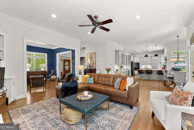 2936 Summitop Rd NE, Marietta, GA 30066 - living area featuring crown molding, ceiling fan, recessed lighting, and light wood finished floors