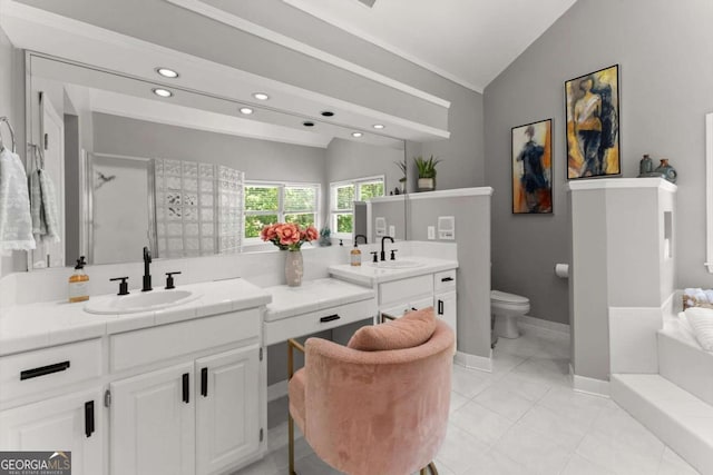 2936 Summitop Rd NE, Marietta, GA 30066 - full bathroom featuring vaulted ceiling, double vanity, toilet, recessed lighting, and tile patterned floors