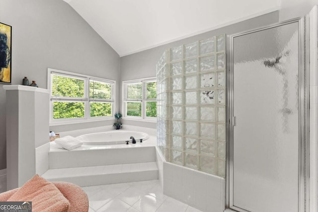 2936 Summitop Rd NE, Marietta, GA 30066 - full bath featuring a bath, a stall shower, tile patterned flooring, and lofted ceiling