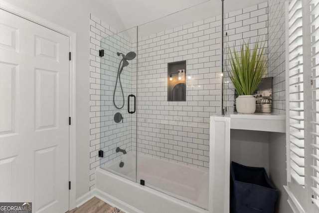 2936 Summitop Rd NE, Marietta, GA 30066 - full bath with shower / bath combination with glass door, lofted ceiling, and wood finished floors