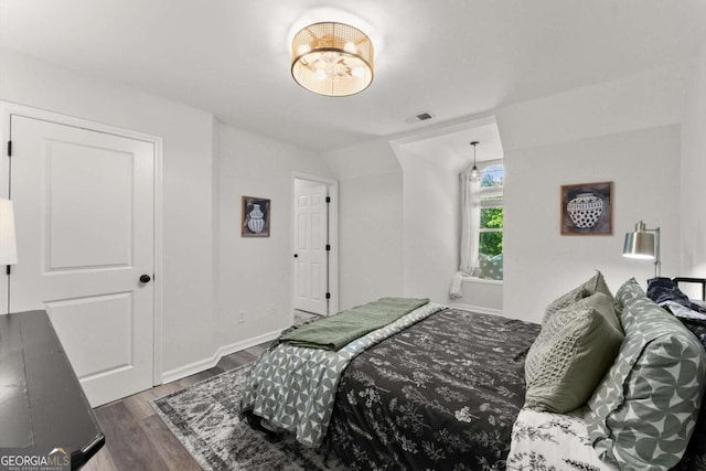 2936 Summitop Rd NE, Marietta, GA 30066 - bedroom featuring wood finished floors and baseboards