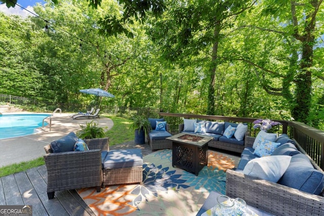 2936 Summitop Rd NE, Marietta, GA 30066 - fenced backyard with an outdoor living space with a fire pit and a wooden deck
