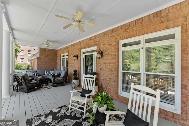 2936 Summitop Rd NE, Marietta, GA 30066 - wooden porch with ceiling fan and outdoor lounge area