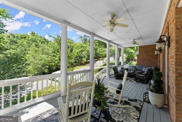2936 Summitop Rd NE, Marietta, GA 30066 - porch with a ceiling fan and an outdoor hangout area