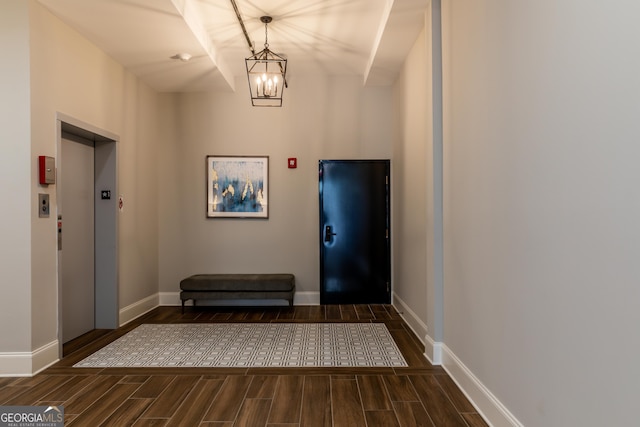 1 E 3rd Ave Unit 302, Rome, GA 30161 - entrance foyer with elevator, wood tiled floors, and a chandelier