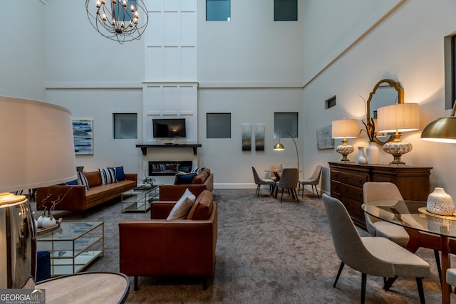 1 E 3rd Ave Unit 302, Rome, GA 30161 - living area featuring a towering ceiling, a chandelier, carpet flooring, and baseboards