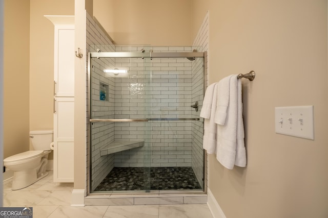 1 E 3rd Ave Unit 302, Rome, GA 30161 - full bath with toilet, a stall shower, baseboards, and marble look tile flooring