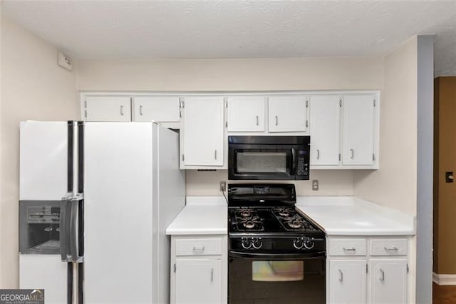 916 Forest Pointe Way, Jonesboro, GA 30238 - kitchen with black appliances, white cabinetry, and light countertops