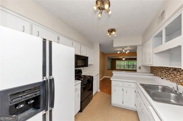 916 Forest Pointe Way, Jonesboro, GA 30238 - kitchen featuring black appliances, a sink, white cabinets, light countertops, and a textured ceiling
