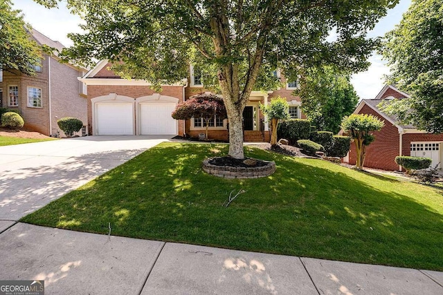 2484 Mossy Branch Dr, Snellville, GA 30078 - view of property hidden behind natural elements featuring concrete driveway, a front yard, and a garage
