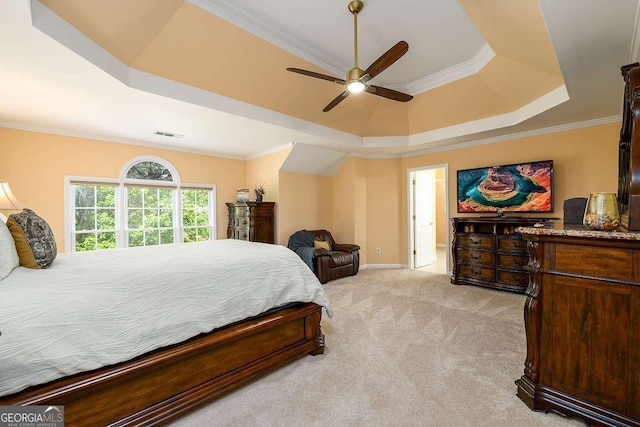 2484 Mossy Branch Dr, Snellville, GA 30078 - bedroom featuring a raised ceiling, light carpet, ornamental molding, baseboards, and ceiling fan