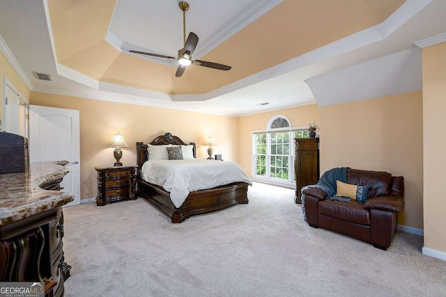 2484 Mossy Branch Dr, Snellville, GA 30078 - bedroom with a raised ceiling, crown molding, light colored carpet, baseboards, and a ceiling fan