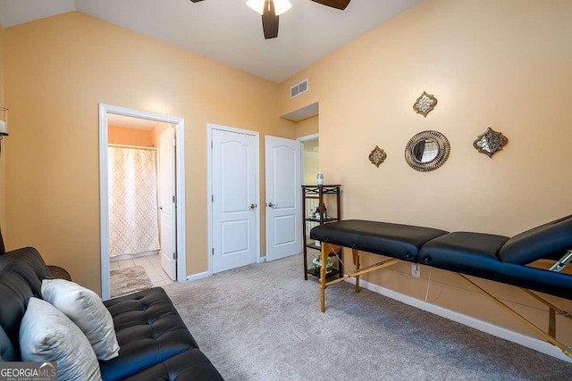 2484 Mossy Branch Dr, Snellville, GA 30078 - living area with ceiling fan, carpet flooring, baseboards, and vaulted ceiling