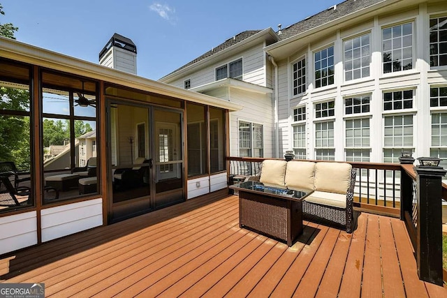 2484 Mossy Branch Dr, Snellville, GA 30078 - wooden terrace featuring a sunroom and an outdoor living space