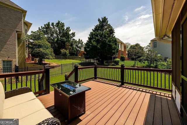 2484 Mossy Branch Dr, Snellville, GA 30078 - deck featuring a fire pit