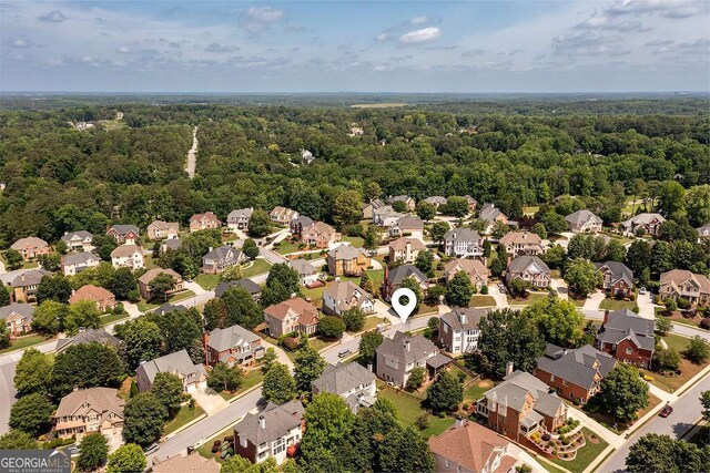 2484 Mossy Branch Dr, Snellville, GA 30078 - aerial perspective of suburban area with a forest