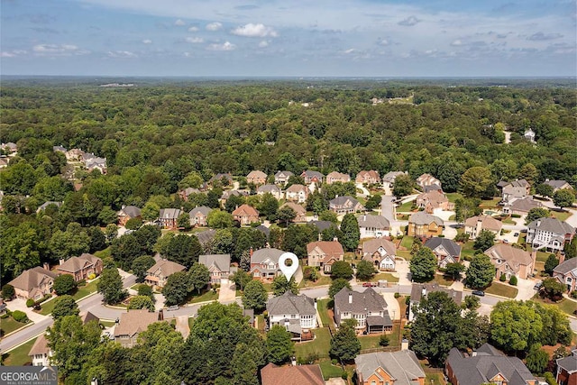 2484 Mossy Branch Dr, Snellville, GA 30078 - aerial perspective of suburban area featuring a forest