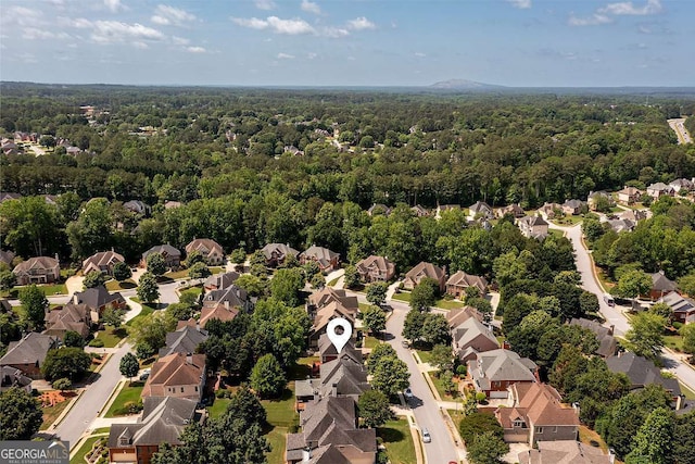 2484 Mossy Branch Dr, Snellville, GA 30078 - aerial perspective of suburban area with a forest