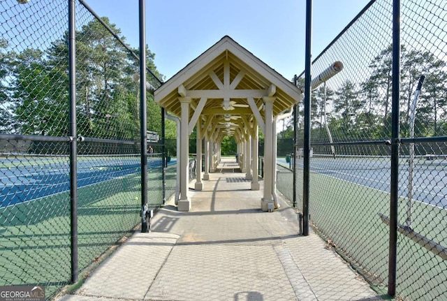 2484 Mossy Branch Dr, Snellville, GA 30078 - view of tennis court with a gazebo and ceiling fan