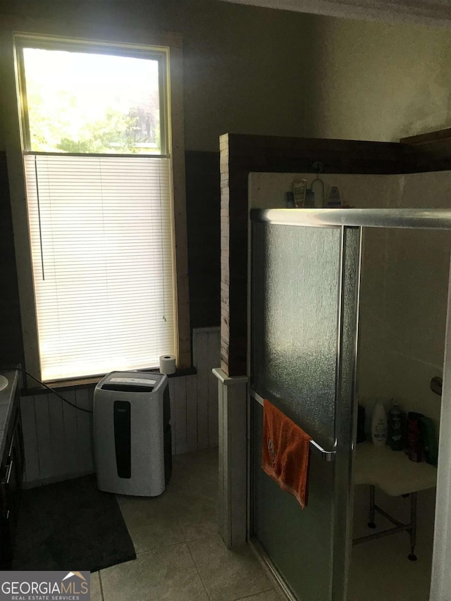 1432 Calhoun St, Macon, GA 31201 - bathroom with vanity, a stall shower, and tile patterned floors
