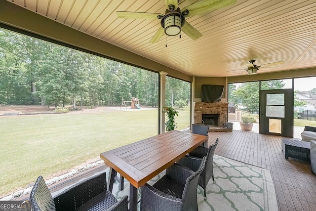 265 Enfield Ln, Mcdonough, GA 30252 - view of patio / terrace with an outdoor brick fireplace, a ceiling fan, and outdoor dining area