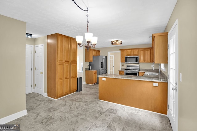 4000 Mcpherson Dr, Acworth, GA 30101 - kitchen with appliances with stainless steel finishes, a chandelier, light countertops, a peninsula, and brown cabinets