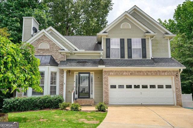 4000 Mcpherson Dr, Acworth, GA 30101 - view of front facade featuring driveway, an attached garage, a shingled roof, a chimney, and brick siding