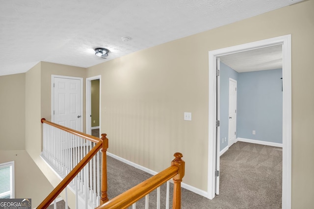 4000 Mcpherson Dr, Acworth, GA 30101 - hallway with an upstairs landing, carpet, and a textured ceiling