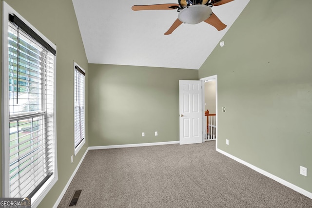 4000 Mcpherson Dr, Acworth, GA 30101 - carpeted empty room with high vaulted ceiling and ceiling fan