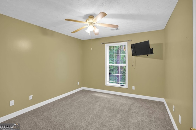 4000 Mcpherson Dr, Acworth, GA 30101 - carpeted spare room featuring a ceiling fan and a textured ceiling