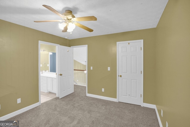 4000 Mcpherson Dr, Acworth, GA 30101 - unfurnished bedroom featuring carpet, ensuite bathroom, and ceiling fan