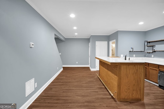 4000 Mcpherson Dr, Acworth, GA 30101 - kitchen with ornamental molding, dark wood finished floors, recessed lighting, light countertops, and open shelves