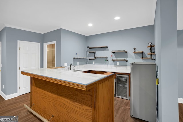 4000 Mcpherson Dr, Acworth, GA 30101 - kitchen with wine cooler, dark wood-style floors, fridge, crown molding, and recessed lighting