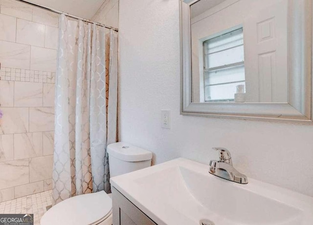 435 Goss Rd, Epworth, GA 30541 - bathroom with toilet, vanity, and a tile shower